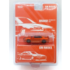 Nissan Skyline GT-R R34 orange - skala 1:64 - DM Model
